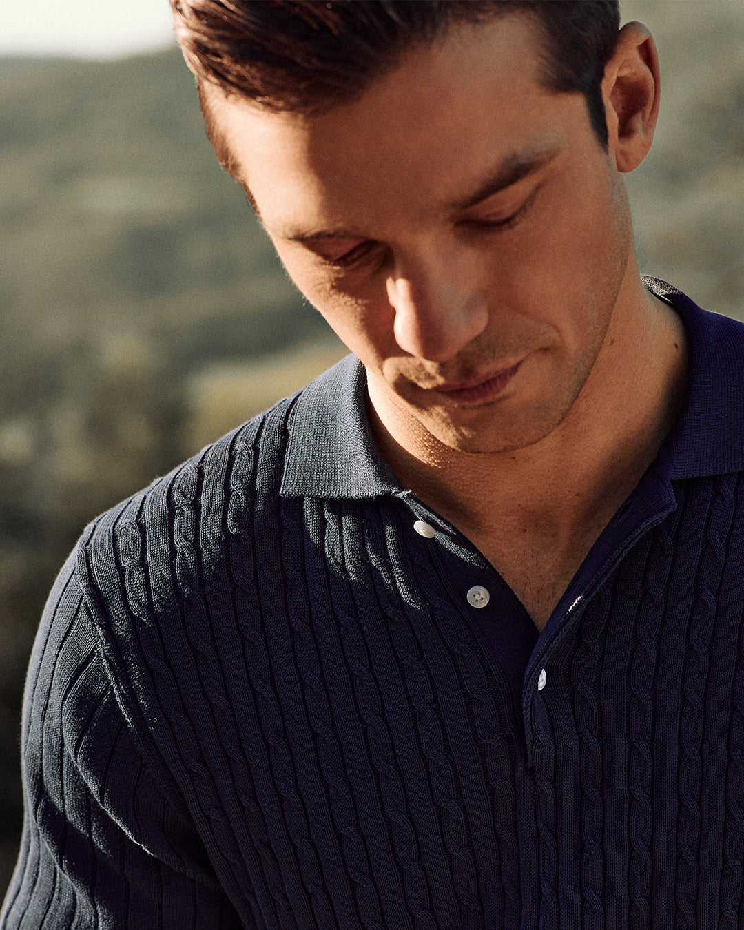 BLUE KNITTED POLO WITH BUTTONS