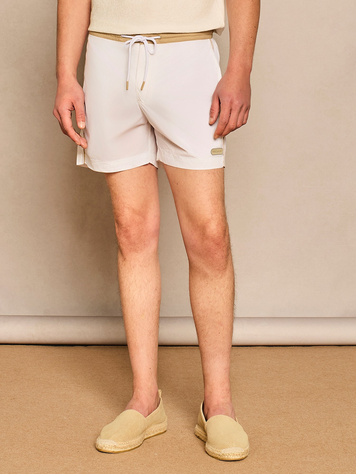 WHITE SWIMSUIT WITH PIPING PATTERN