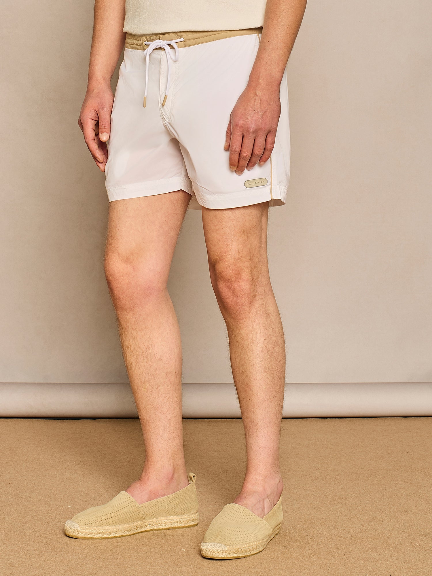 WHITE SWIMSUIT WITH PIPING PATTERN