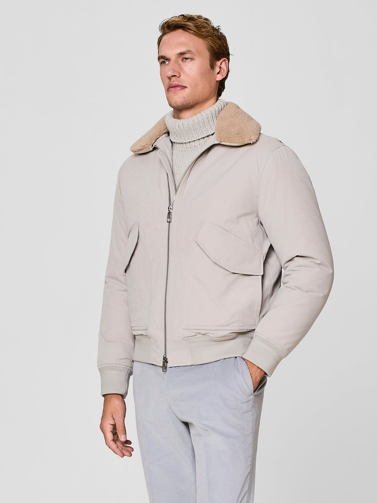 Bomber aviatore con collo in eco shearling burro