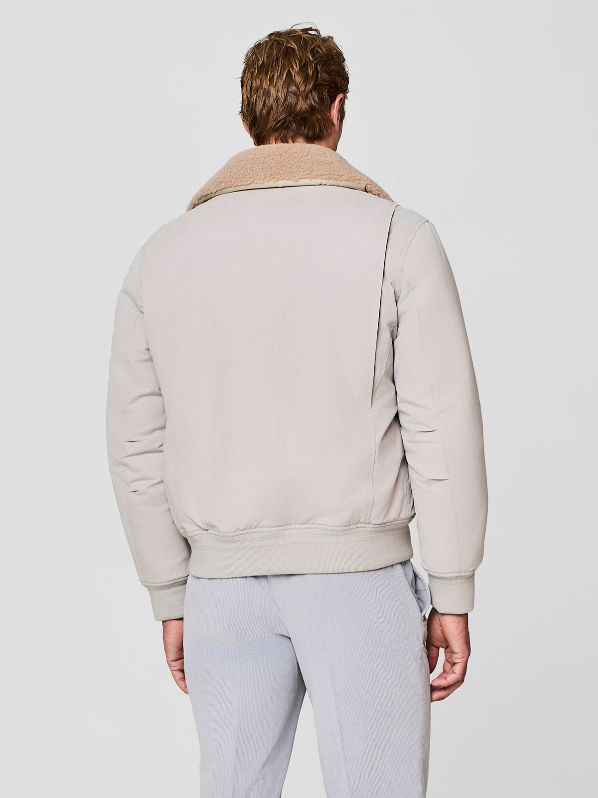 Bomber aviatore con collo in eco shearling burro